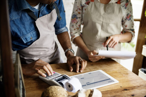 man and woman preparing for small business Saturday